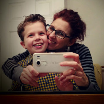 Carmen Valero-Aracama and her son, Luca, smile for a selfie. Courtesy photo.